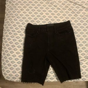 Black pair of jean shorts